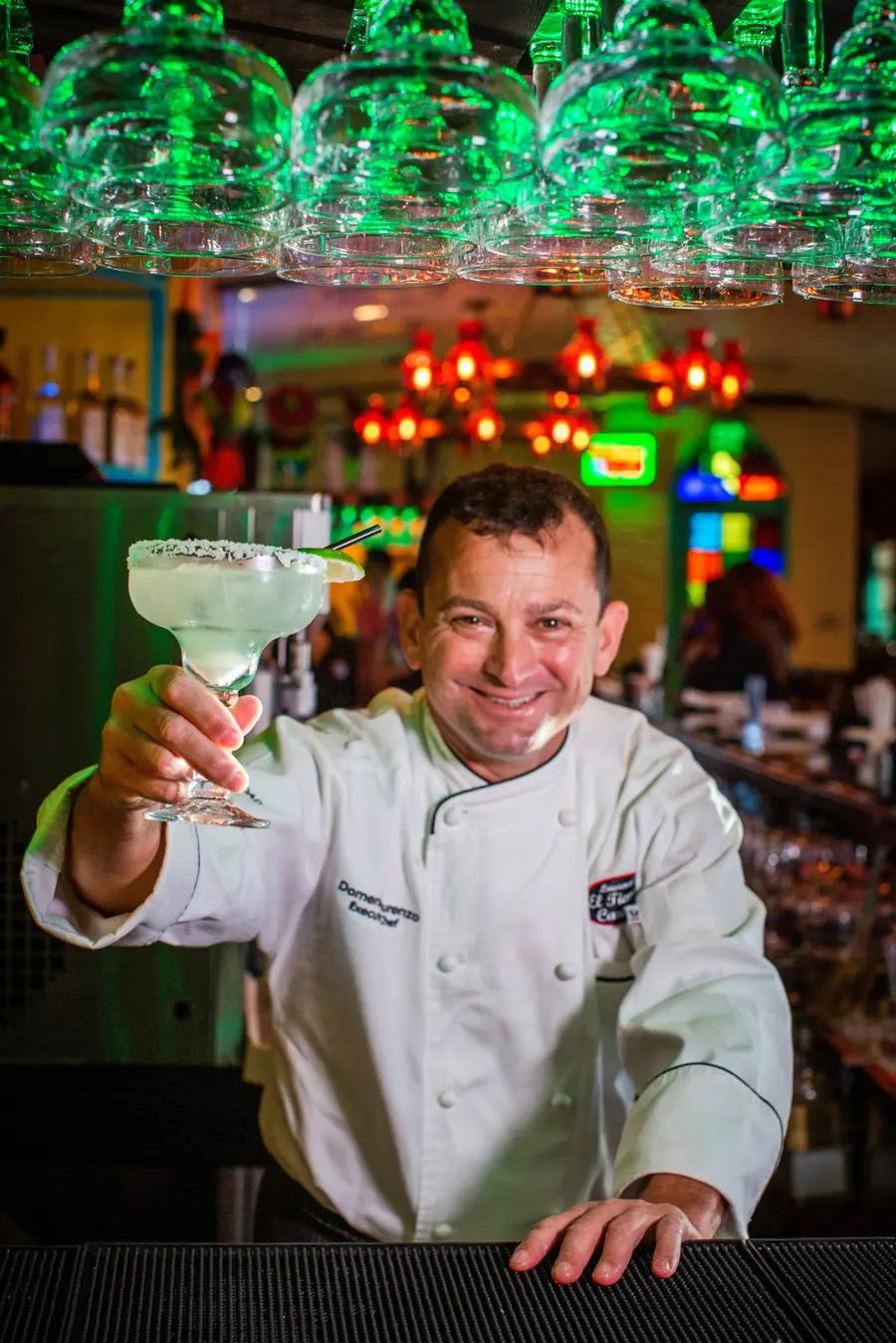 Domenic Laurenzo sharing a toast at El Tiempo Cantina