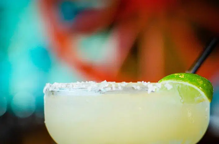 Salt-rimmed El Tiempo margarita with lime